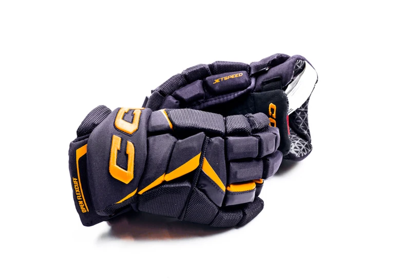 IJshockey handschoenen CCM JetSpeed FT6 Pro Navy/Sunflower Junior 12 inch