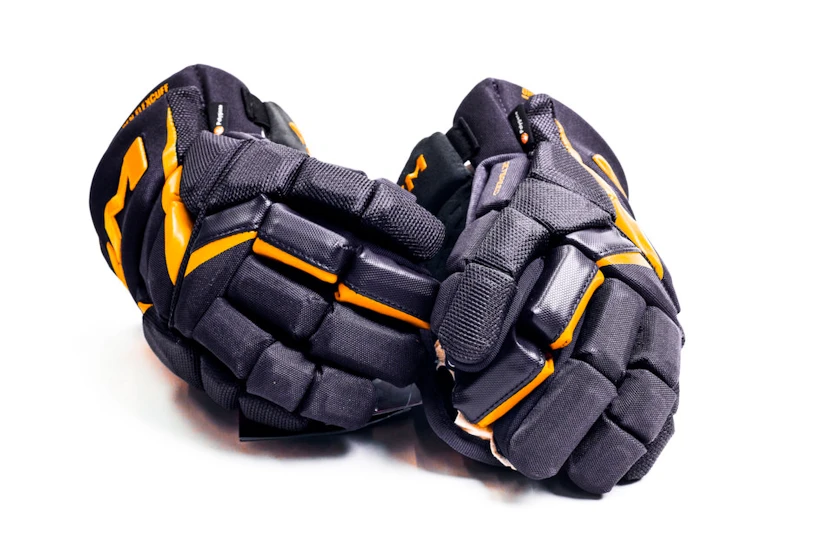 IJshockey handschoenen CCM JetSpeed FT6 Pro Navy/Sunflower Junior 12 inch